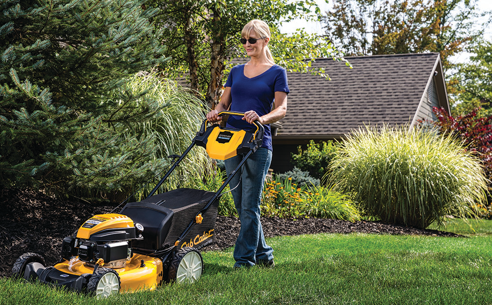 Cub Cadet self-propelled push mower in use