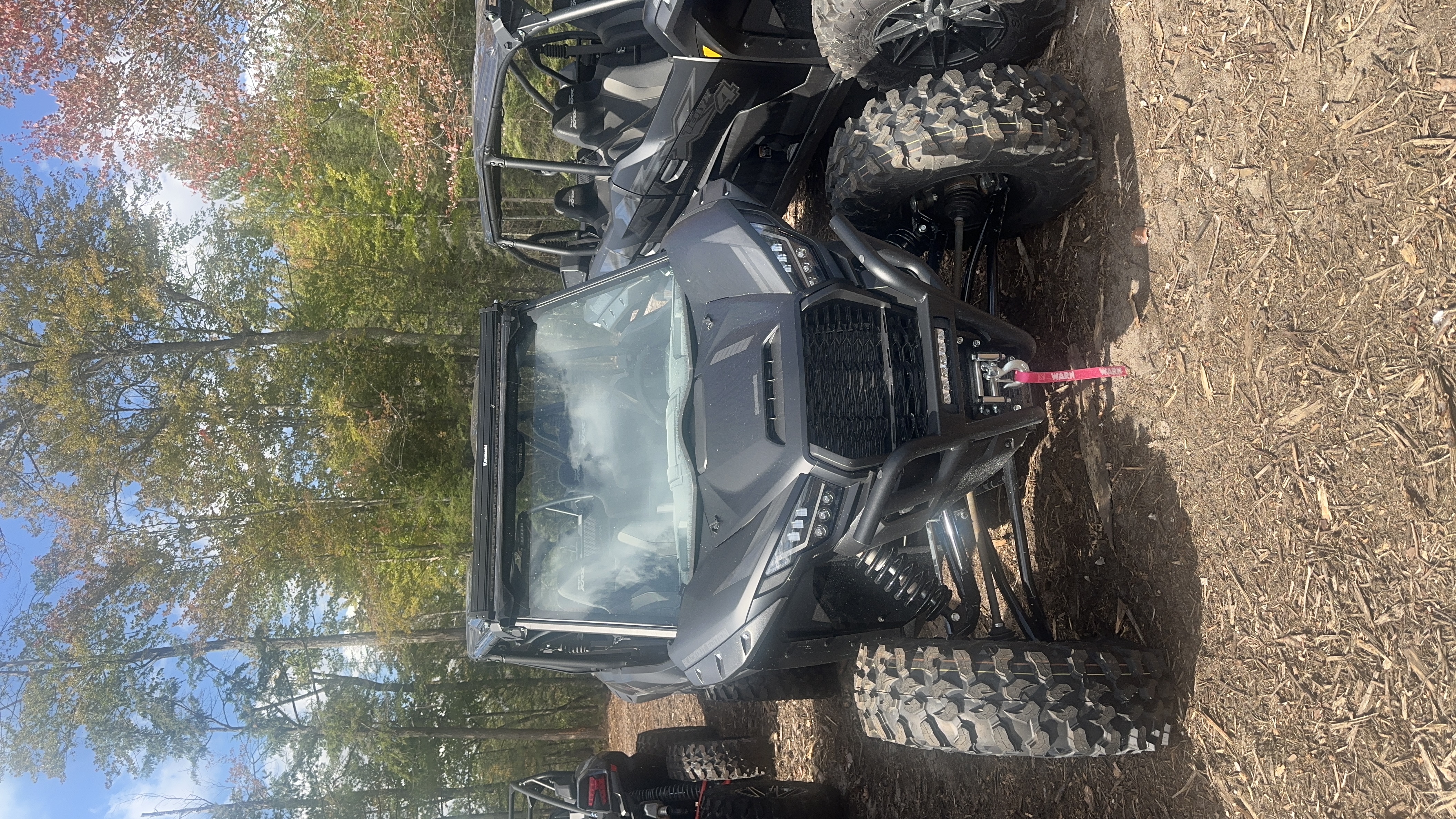 2026 Kawasaki Teryx KRX4 1000 Blackout Edition with glass windshield and rear panel UTV